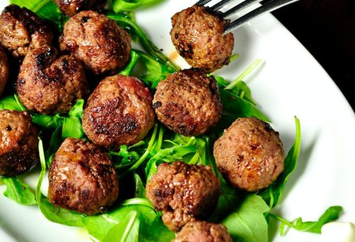 meat balls on oval white plate